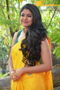 Actress Faria Abdullah in a Yellow Saree and a Green Blouse