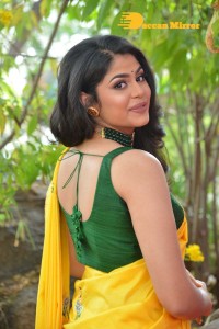 Actress Faria Abdullah in a Yellow Saree and a Green Blouse
