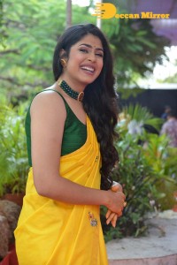 Actress Faria Abdullah in a Yellow Saree and a Green Blouse