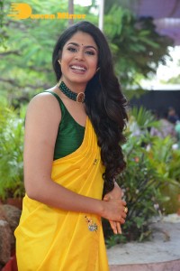 Actress Faria Abdullah in a Yellow Saree and a Green Blouse