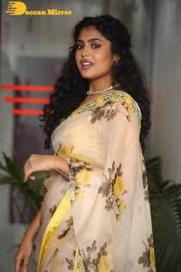 Actress Faria Abdullah in a light yellow saree