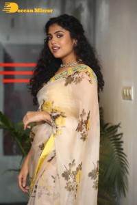Actress Faria Abdullah in a light yellow saree