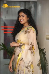 Actress Faria Abdullah in a light yellow saree