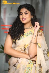 Actress Faria Abdullah in a light yellow saree