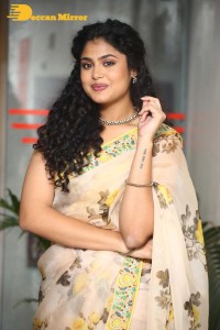 Actress Faria Abdullah in a light yellow saree