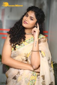 Actress Faria Abdullah in a light yellow saree