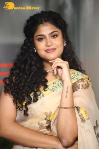 Actress Faria Abdullah in a light yellow saree