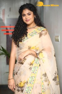 Actress Faria Abdullah in a light yellow saree