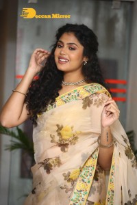 Actress Faria Abdullah in a light yellow saree