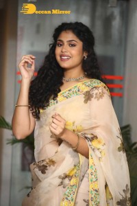 Actress Faria Abdullah in a light yellow saree