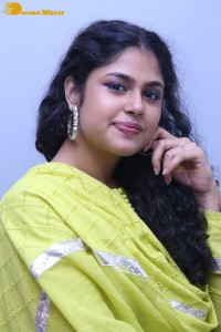 Faria Abdullah in a green dress