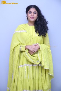 Faria Abdullah in a green dress