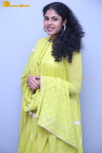 Faria Abdullah in a green dress