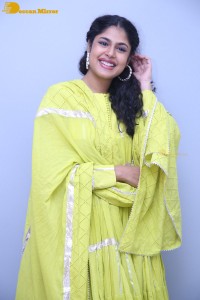 Faria Abdullah in a green dress