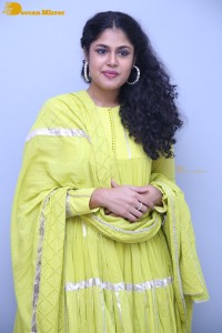 Faria Abdullah in a green dress