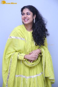 Faria Abdullah in a green dress