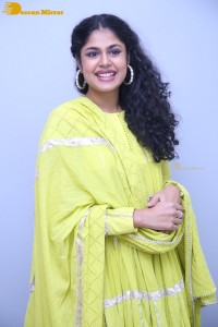 Faria Abdullah in a green dress