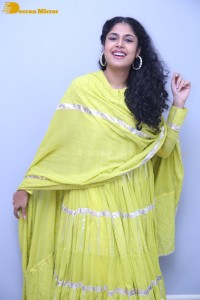 Faria Abdullah in a green dress