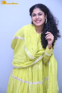 Faria Abdullah in a green dress
