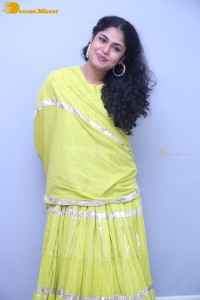 Faria Abdullah in a green dress