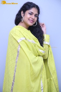 Faria Abdullah in a green dress