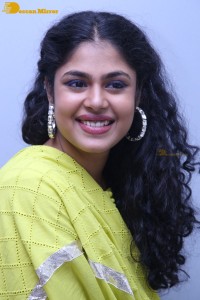 Faria Abdullah in a green dress