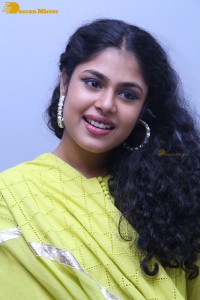 Faria Abdullah in a green dress