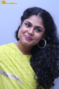 Faria Abdullah in a green dress