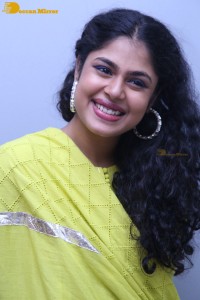 Faria Abdullah in a green dress