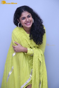 Faria Abdullah in a green dress