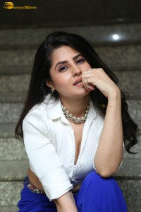 actress garima kaushal hot photoshoot in a white shirt