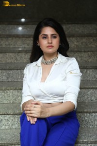 actress garima kaushal hot photoshoot in a white shirt