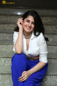 actress garima kaushal hot photoshoot in a white shirt