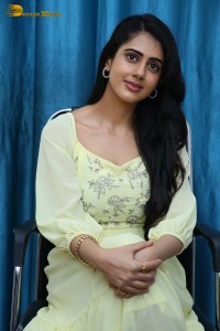 Indian Actress Gehna Sippy in a light yellow dress