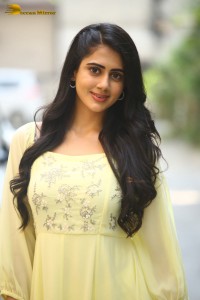 Indian Actress Gehna Sippy in a light yellow dress