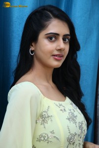 Indian Actress Gehna Sippy in a light yellow dress