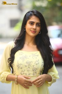 Indian Actress Gehna Sippy in a light yellow dress