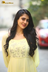 Indian Actress Gehna Sippy in a light yellow dress