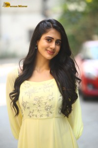 Indian Actress Gehna Sippy in a light yellow dress