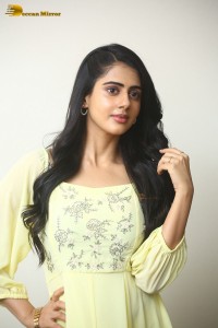 Indian Actress Gehna Sippy in a light yellow dress