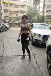 actress Giorgia Andriani sexy in workout attire