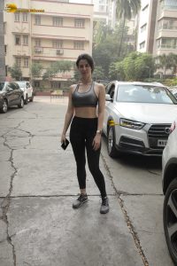 actress Giorgia Andriani sexy in workout attire