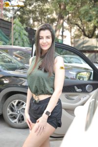 actress Giorgia Andriani beautiful in green top and black shorts