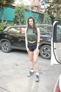actress Giorgia Andriani beautiful in green top and black shorts