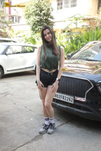 actress Giorgia Andriani beautiful in green top and black shorts
