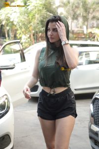 actress Giorgia Andriani beautiful in green top and black shorts