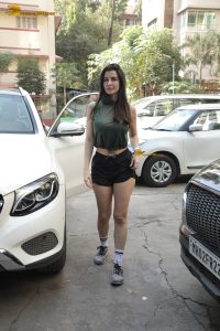 actress Giorgia Andriani beautiful in green top and black shorts