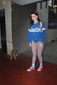 actress Giorgia Andriani pretty in a blue sweater and pink tights