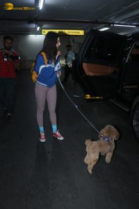 actress Giorgia Andriani pretty in a blue sweater and pink tights