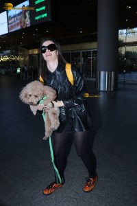 actress Giorgia Andriani with her cute dog at mumbai airport